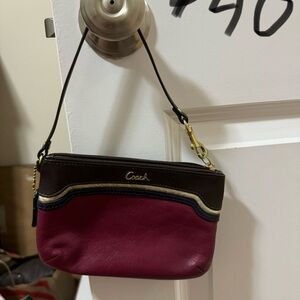 COACH multi-color wristlet